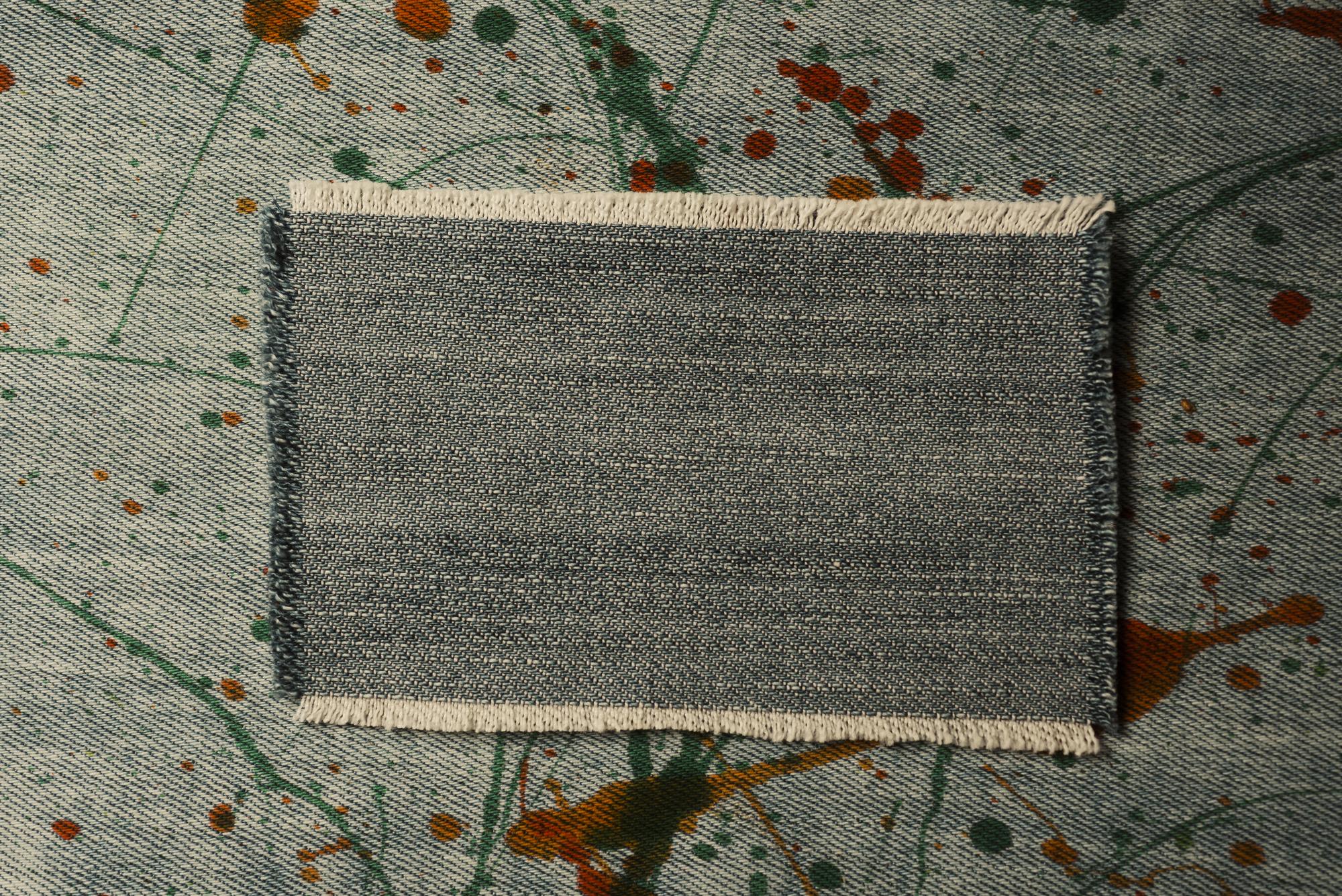 Three embroidered patches and a sample card